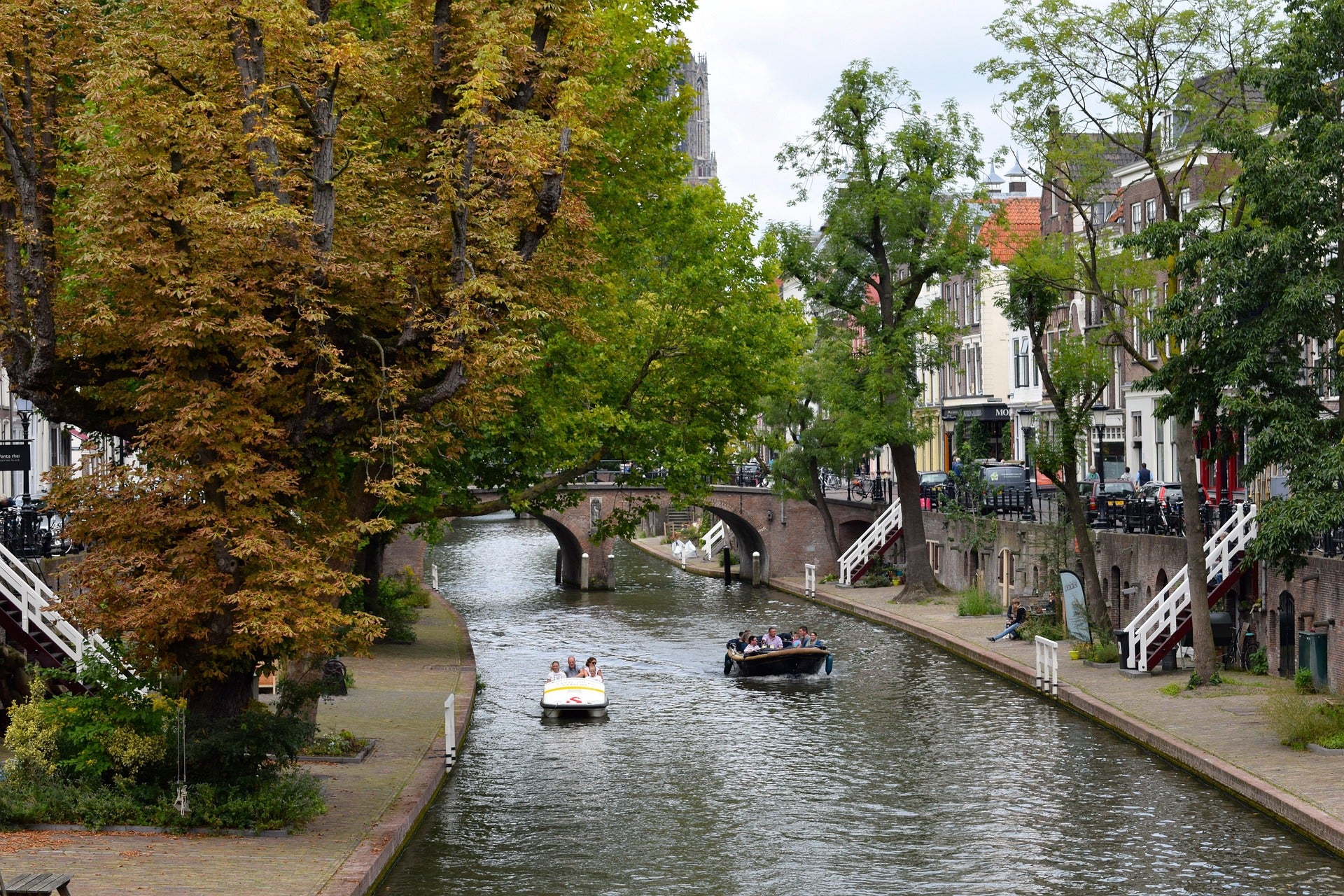 Canal scene with boats and trees in a European city