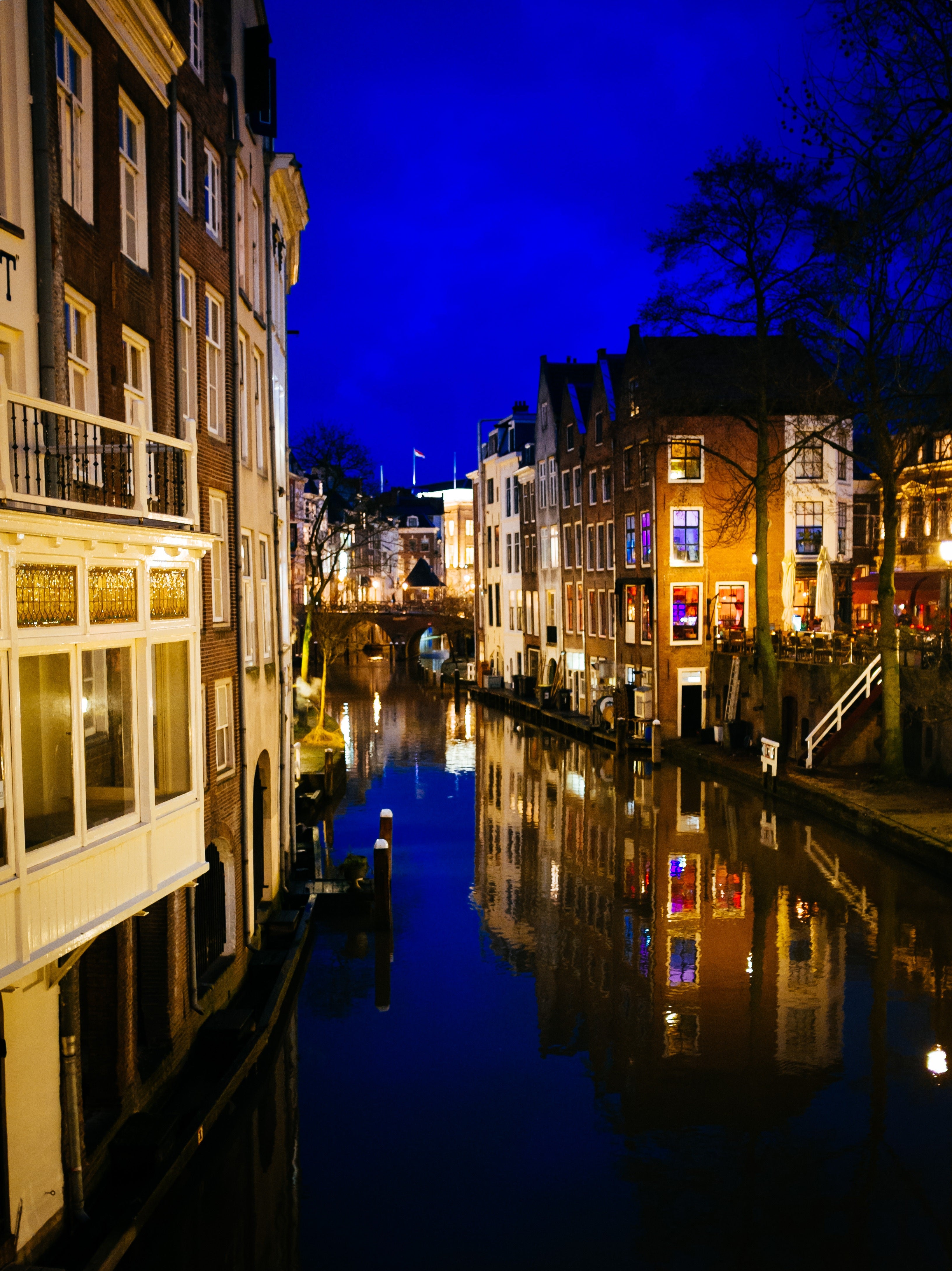 Canal scene with illuminated buildings at night